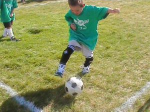 Kid_playing_soccer